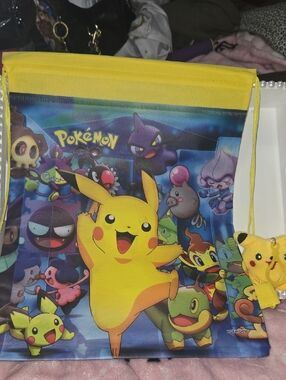 NEW..Pokémon Pikachu Drawstring Backpack - Yellow/Blue Witj Bag Charm